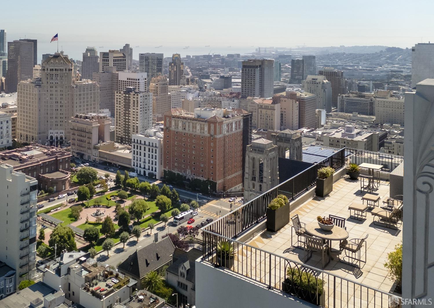 a view of a city with tall buildings