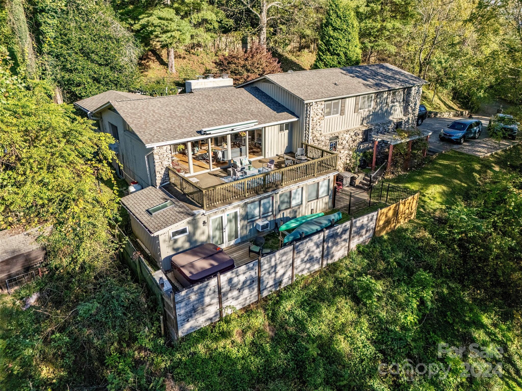 an aerial view of a house with a garden