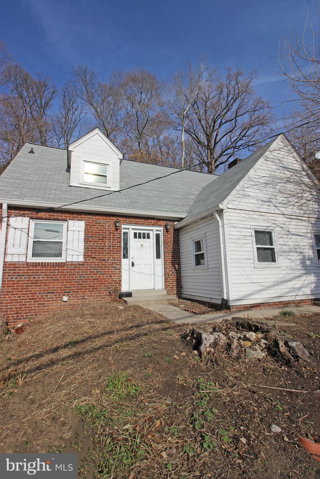 a front view of house with yard