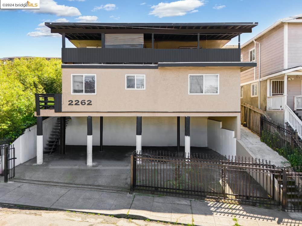 a front view of a house with a balcony