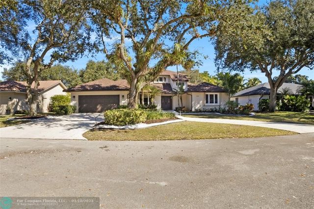 $1,300,000 | 1031 Southwest 91st Avenue | Jacaranda