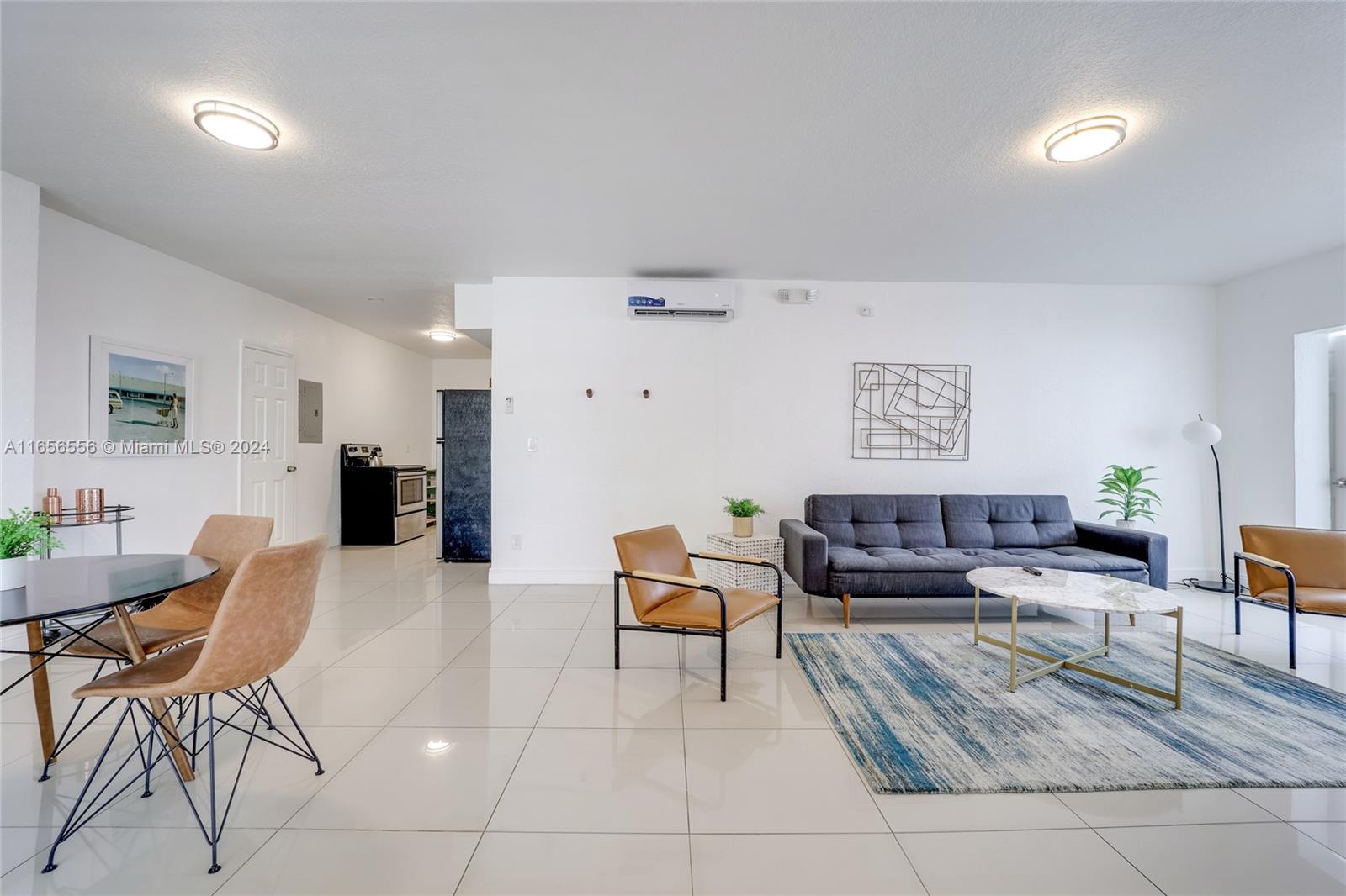 a living room with furniture and a table