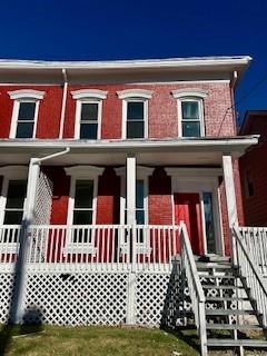 View of front facade with a porch