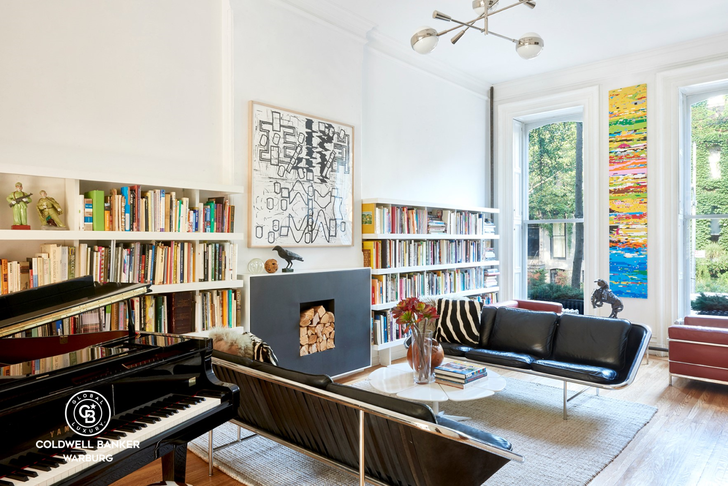 a work room with furniture window and book shelf