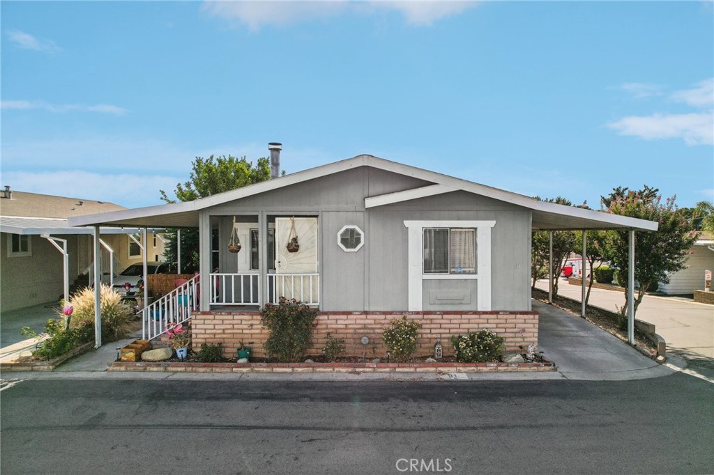 a front view of a house with garage