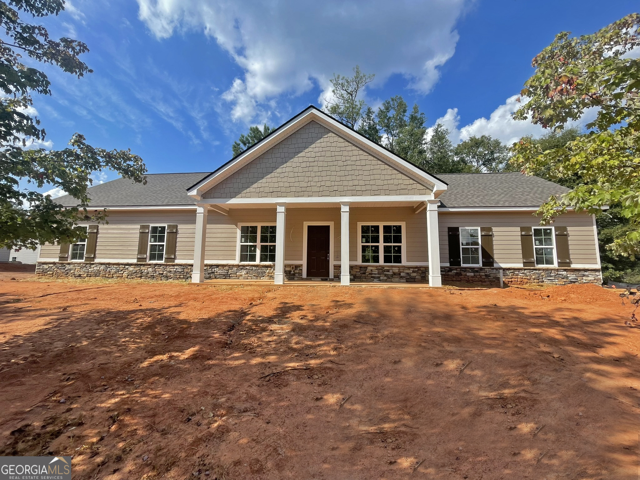 front view of a house and a yard