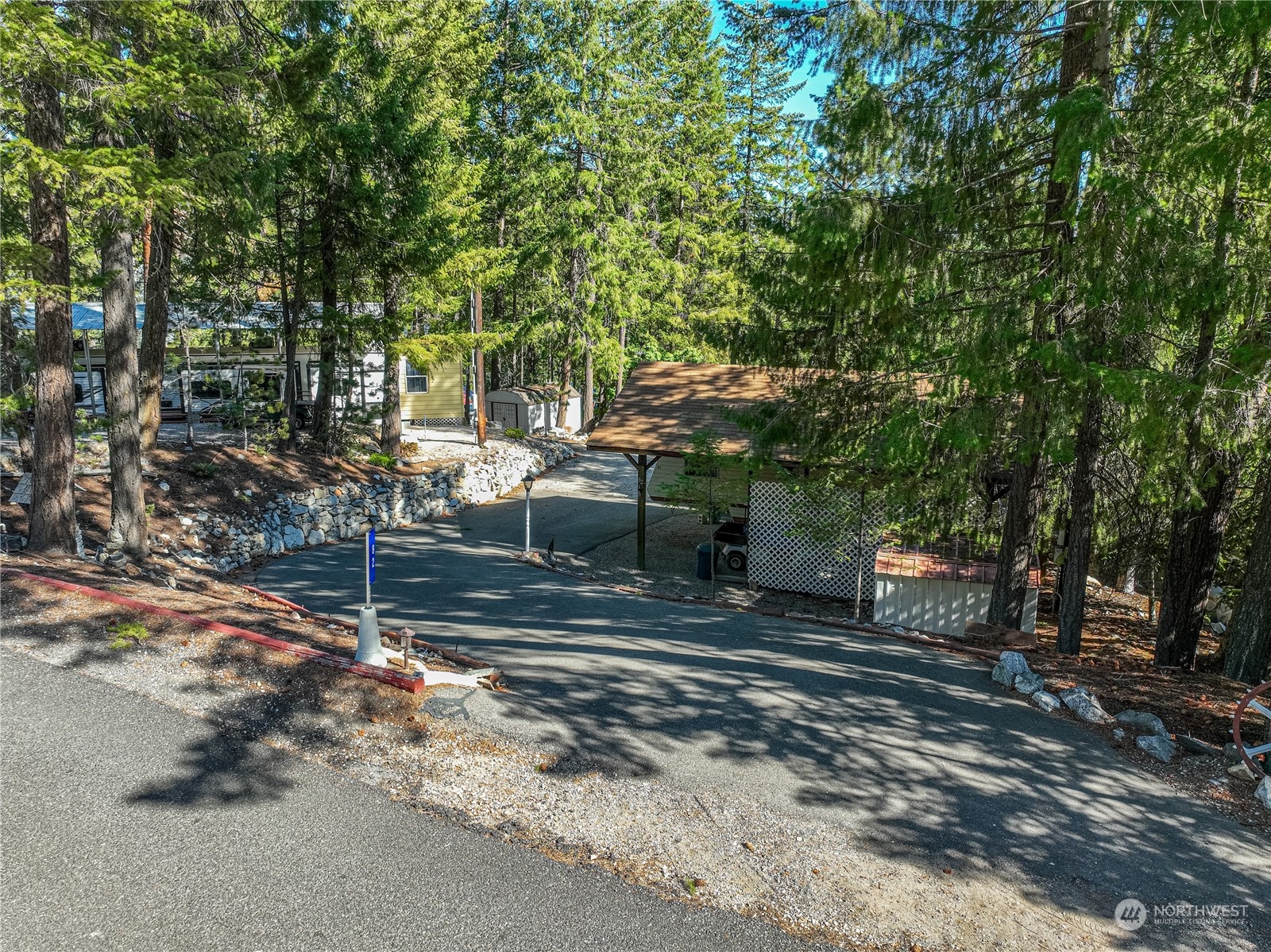 a view of a backyard with trees