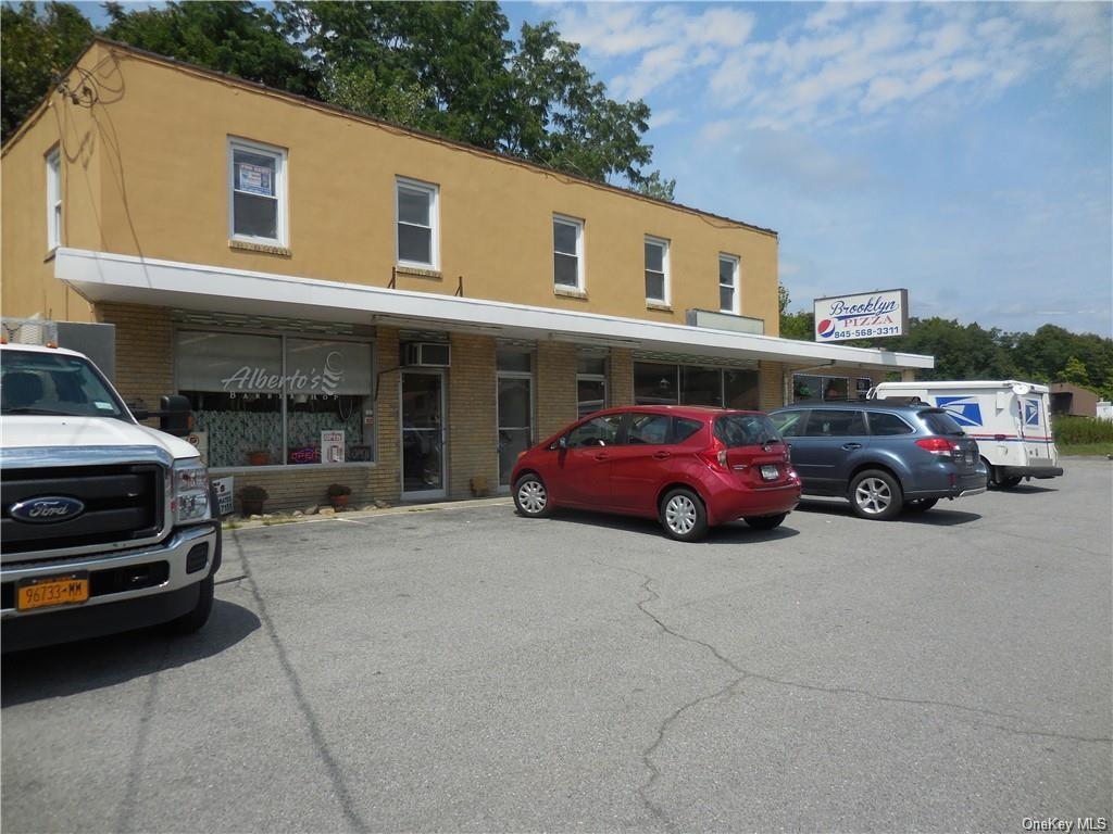 a view of a cars parked in front of a building