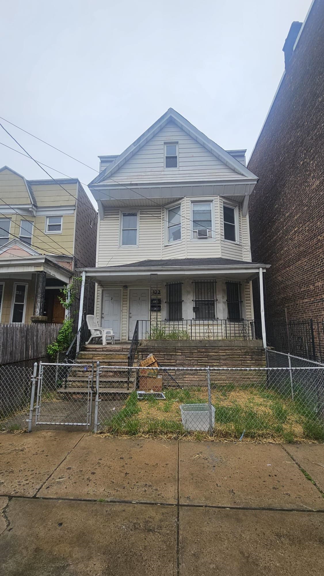 a front view of a house with balcony