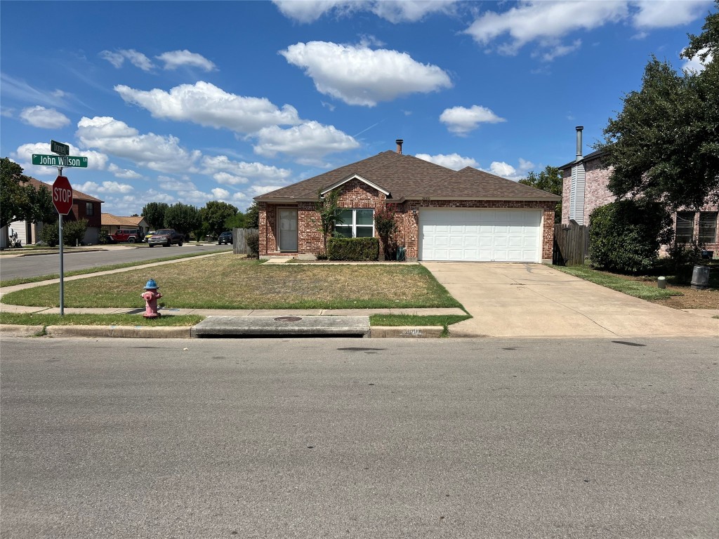 front view of house with a yard