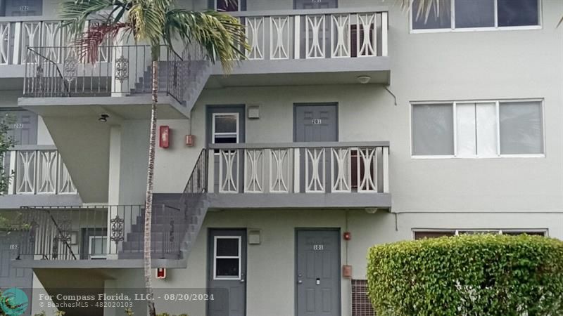 a front view of a house with balcony