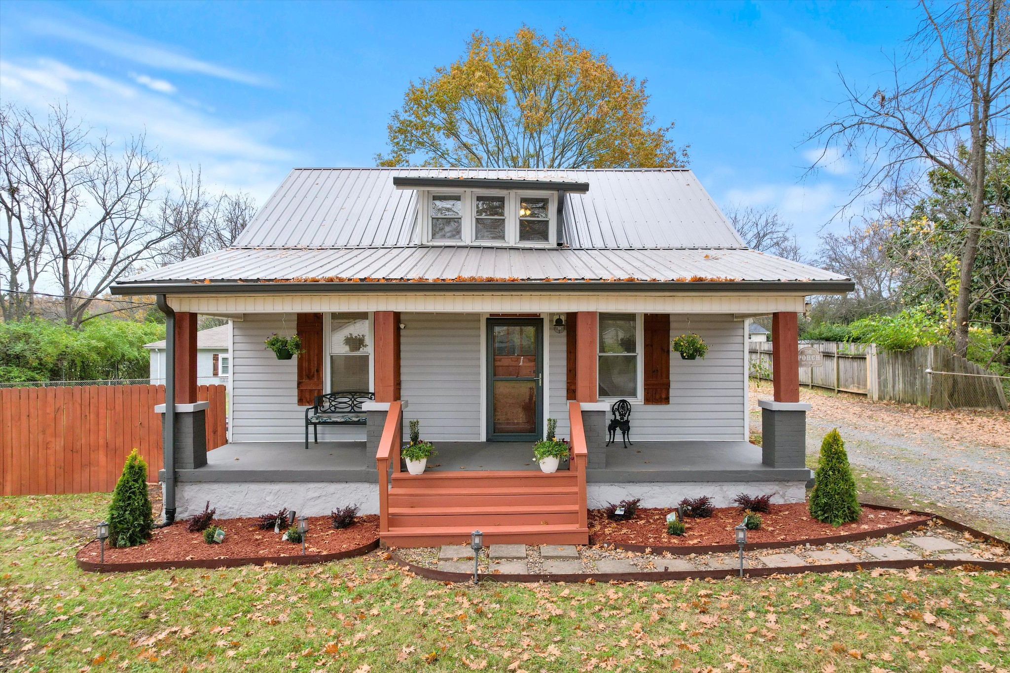 front view of a house with a yard