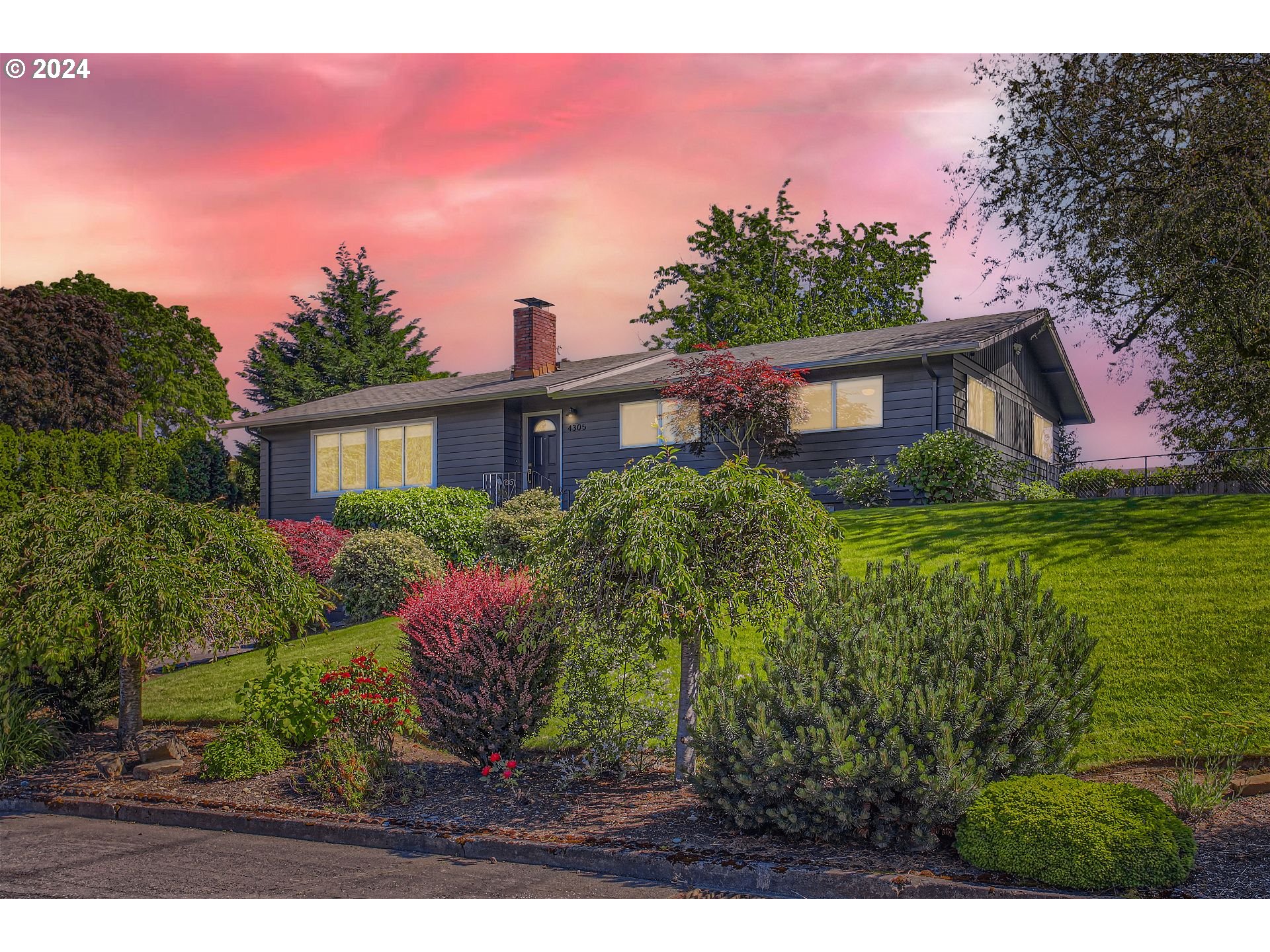 a view of a house with garden