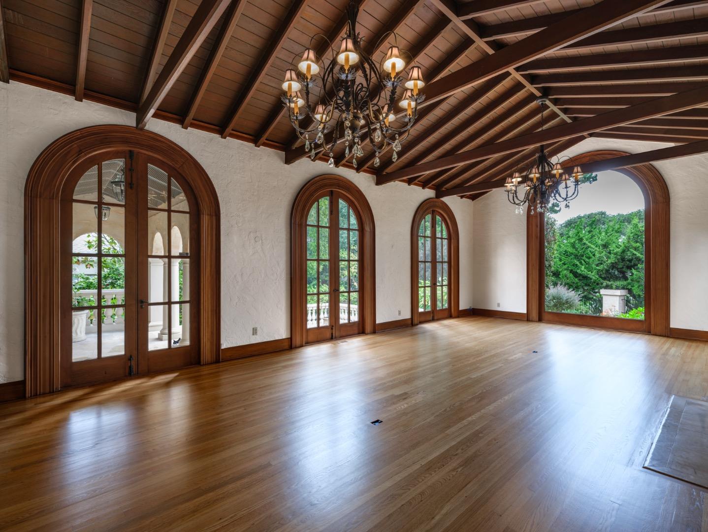 a view of an entryway with wooden floor