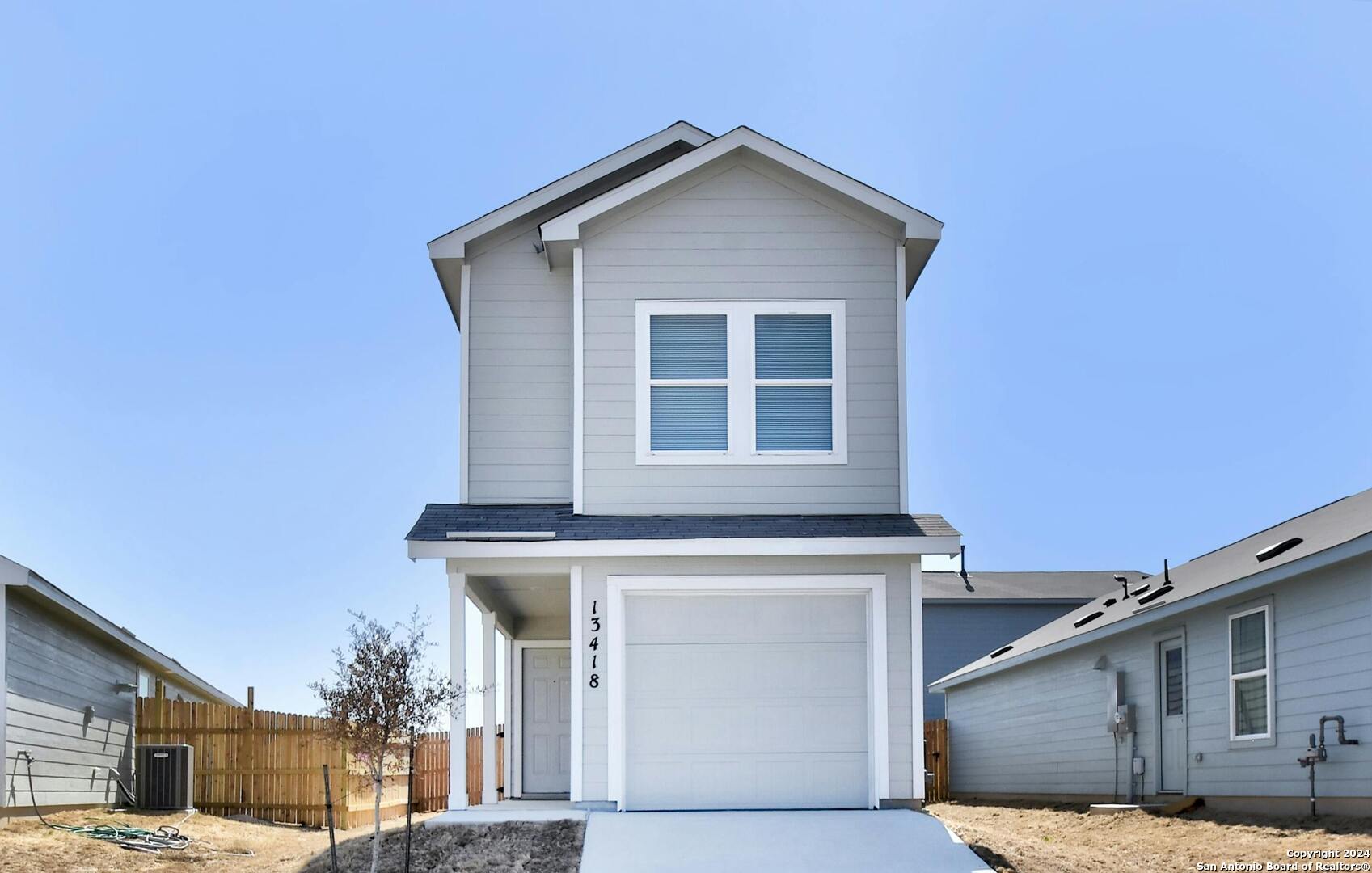 a view of a house with a garage