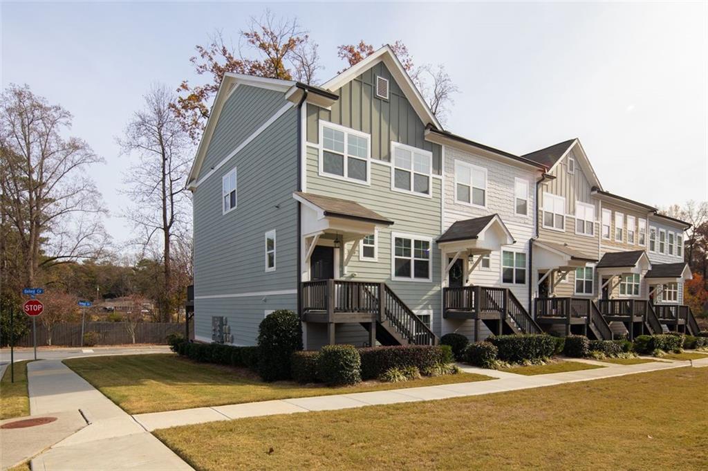 a front view of a house with yard