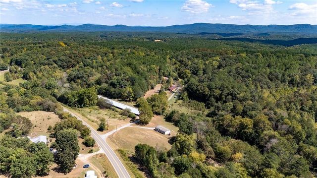 $1,250,000 | 7169 Red Bud Road Northeast