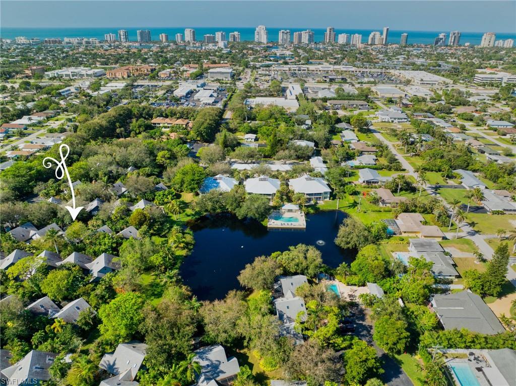 Aerial view featuring a water view