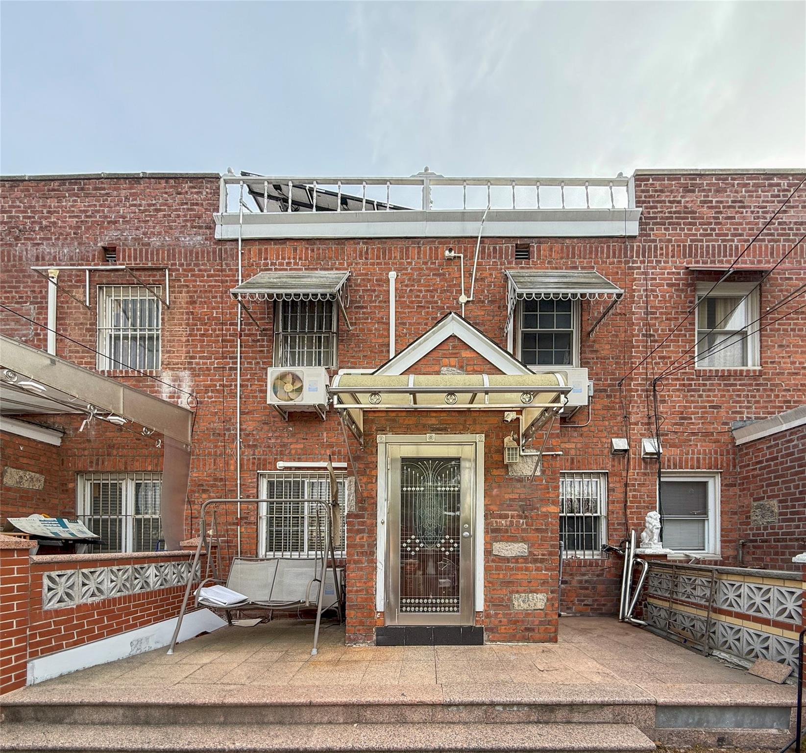 View of front of property with ac unit