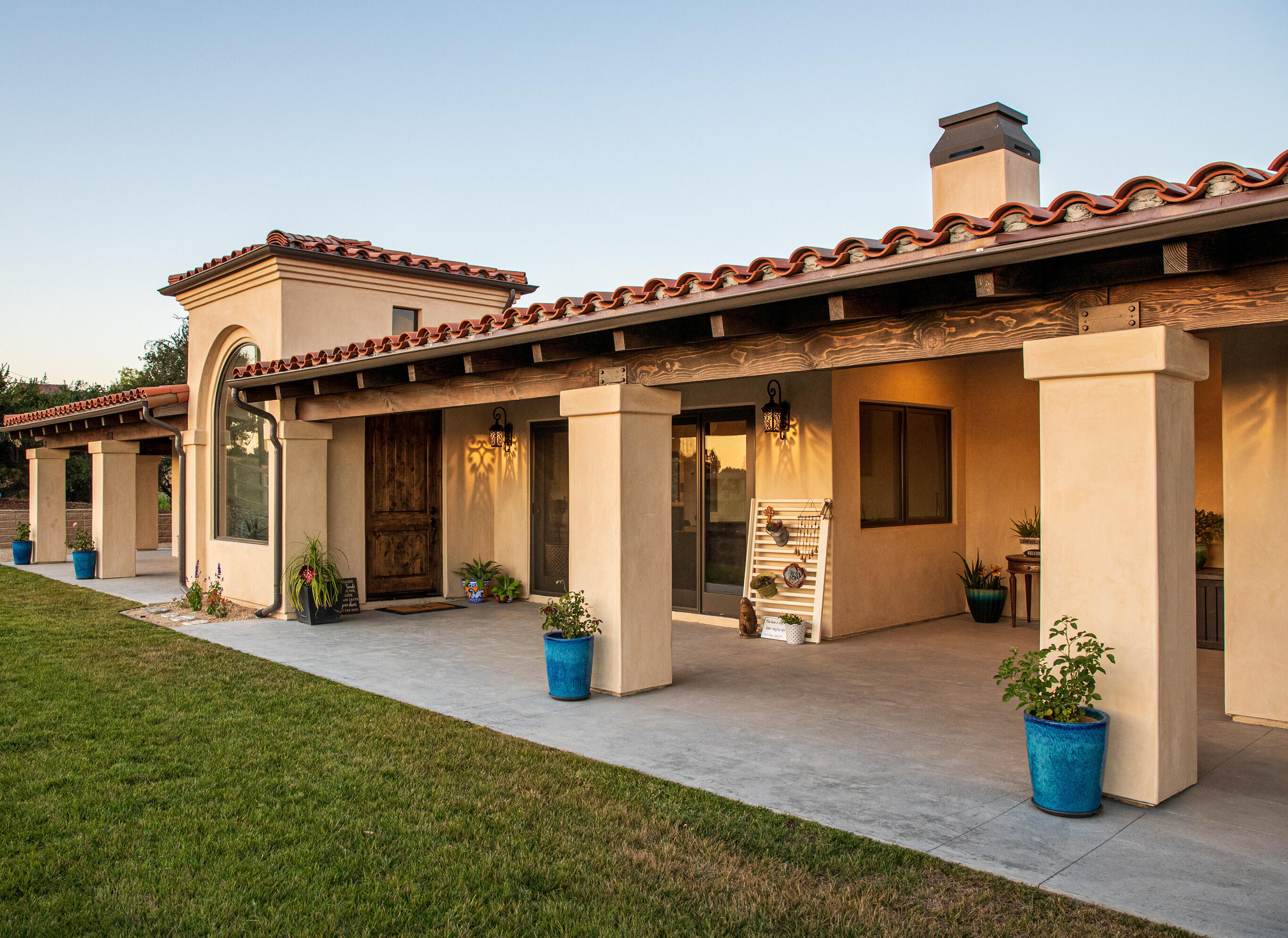 a view of a house with large space and a porch