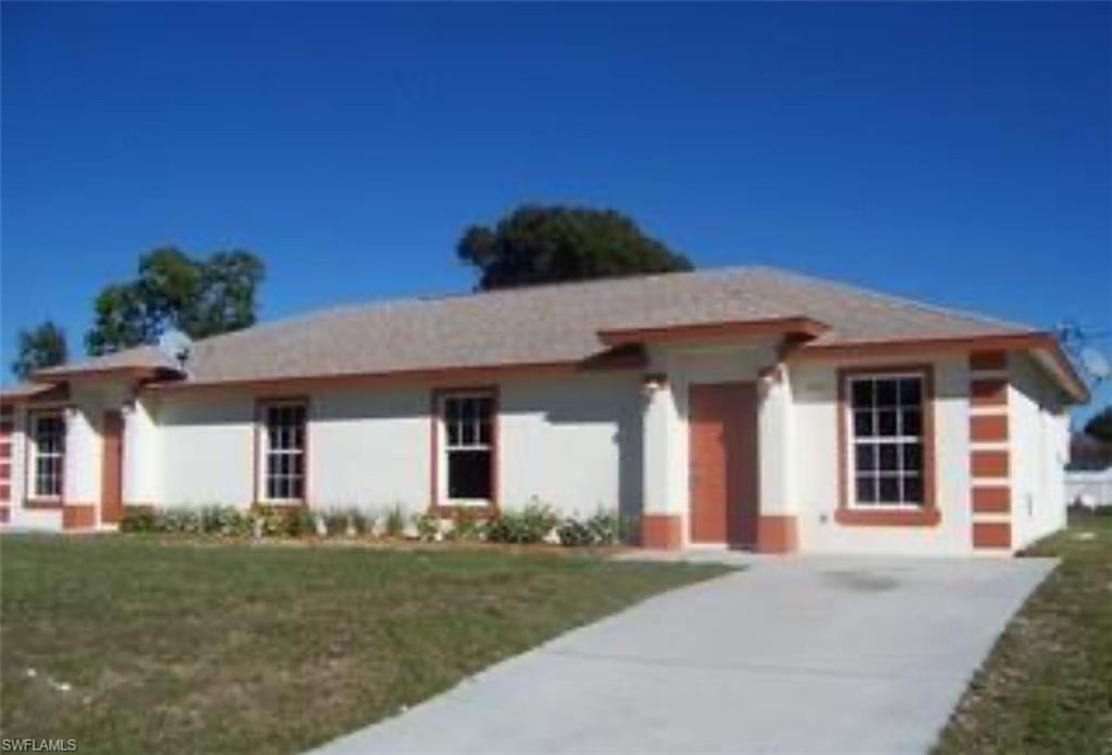 View of front of home with a front yard