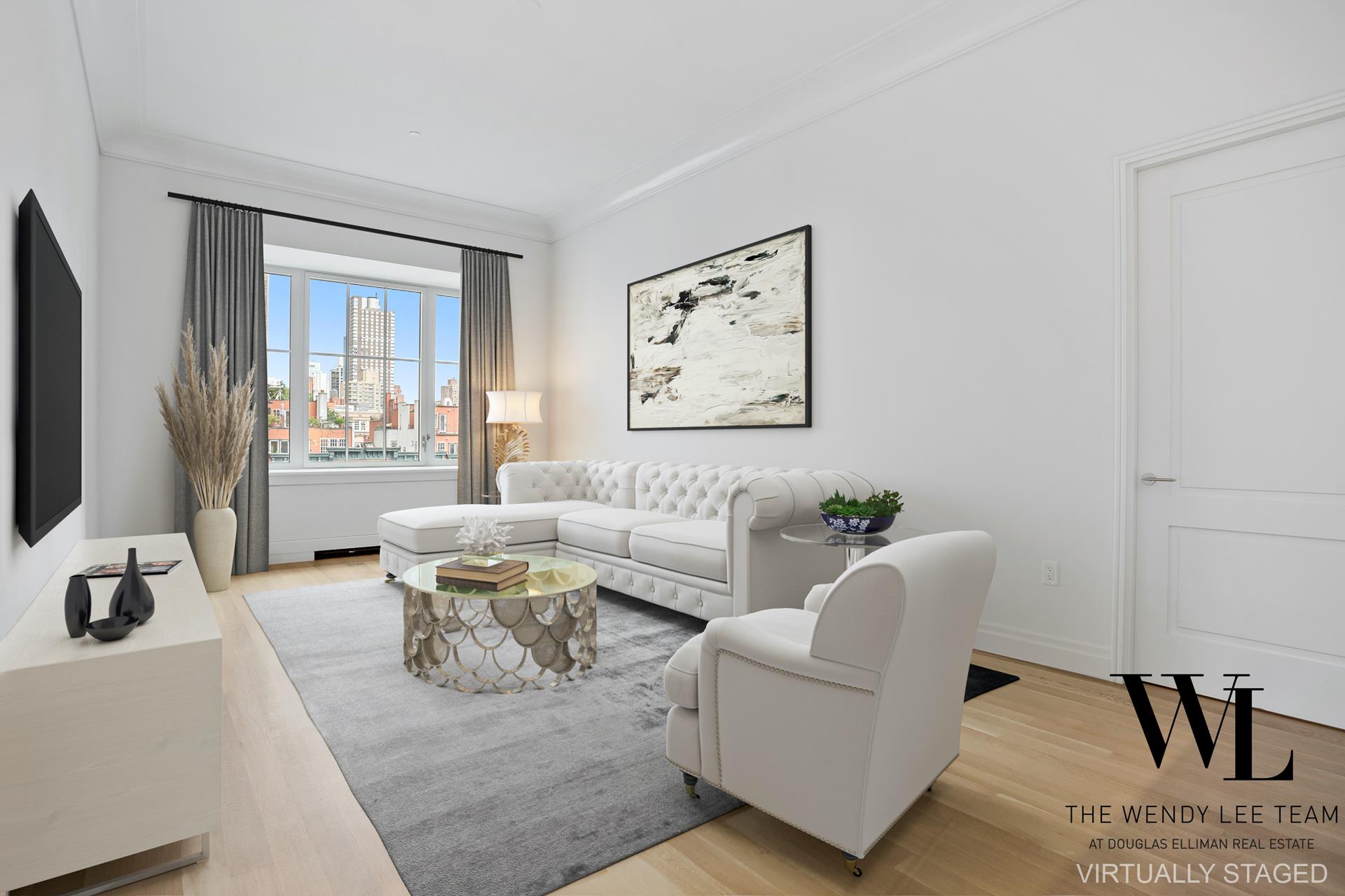 a living room with furniture and a flat screen tv