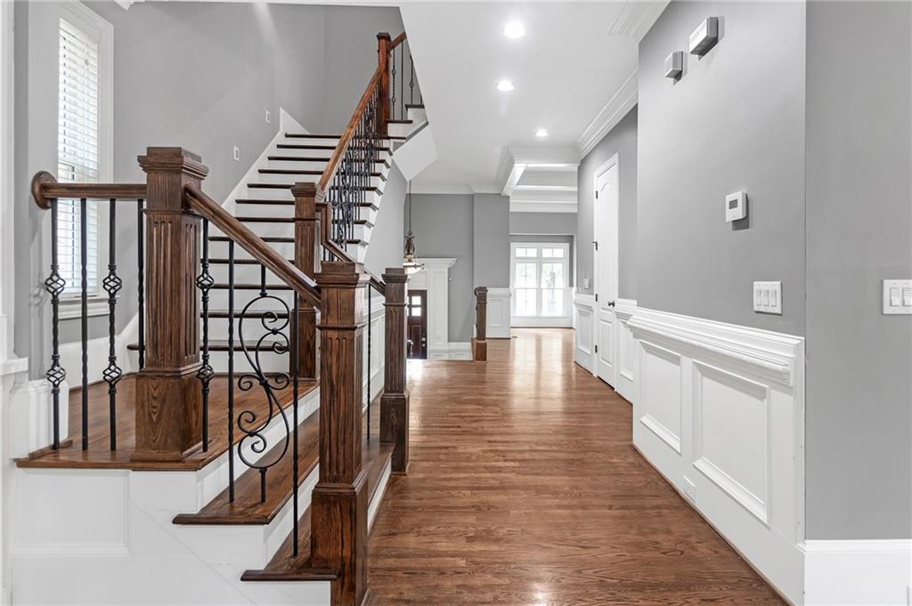 a view of entryway with wooden floor