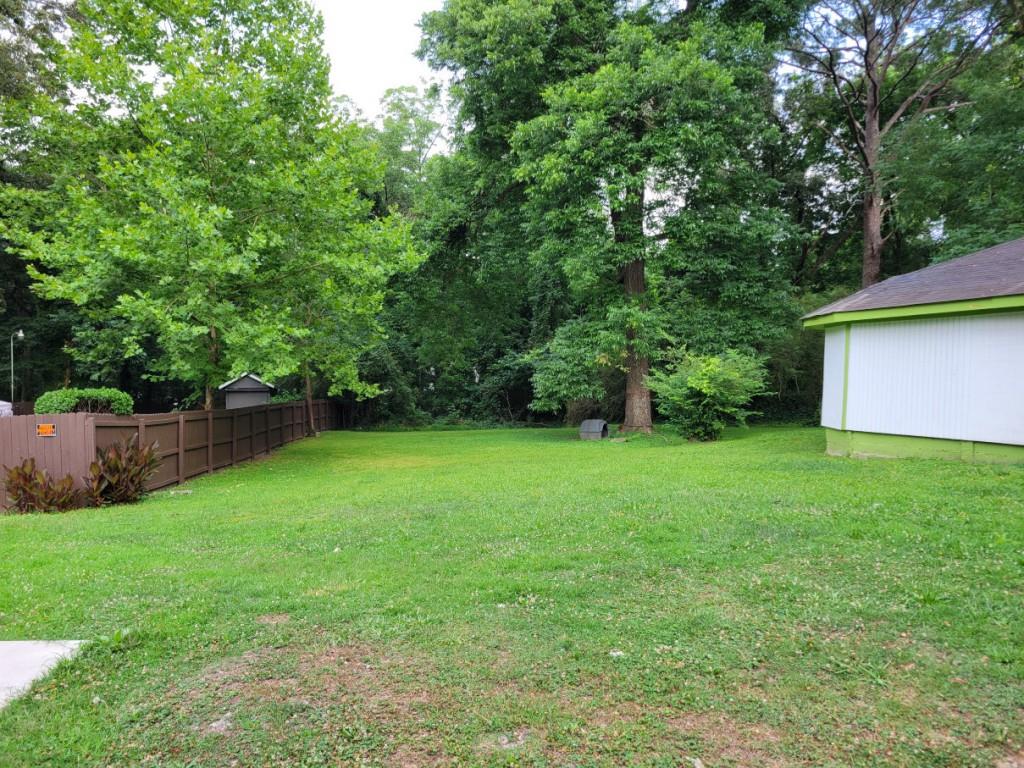 a view of a backyard with a garden