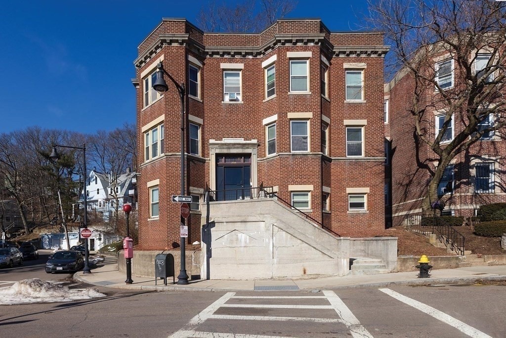 a view of a building with a street