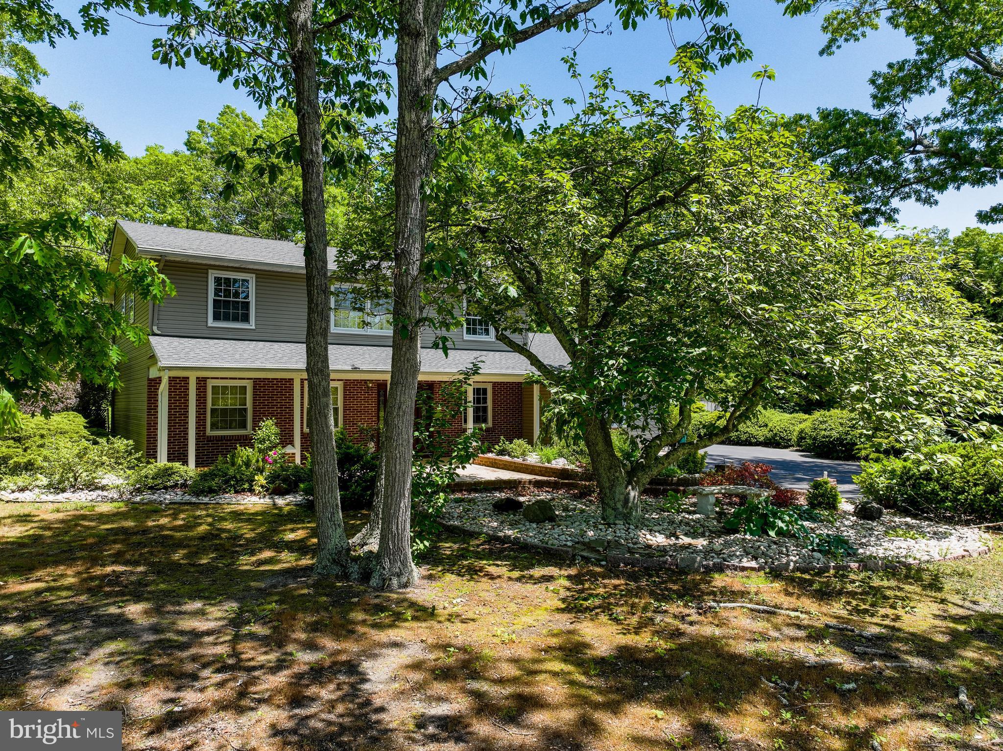 a front view of house with yard