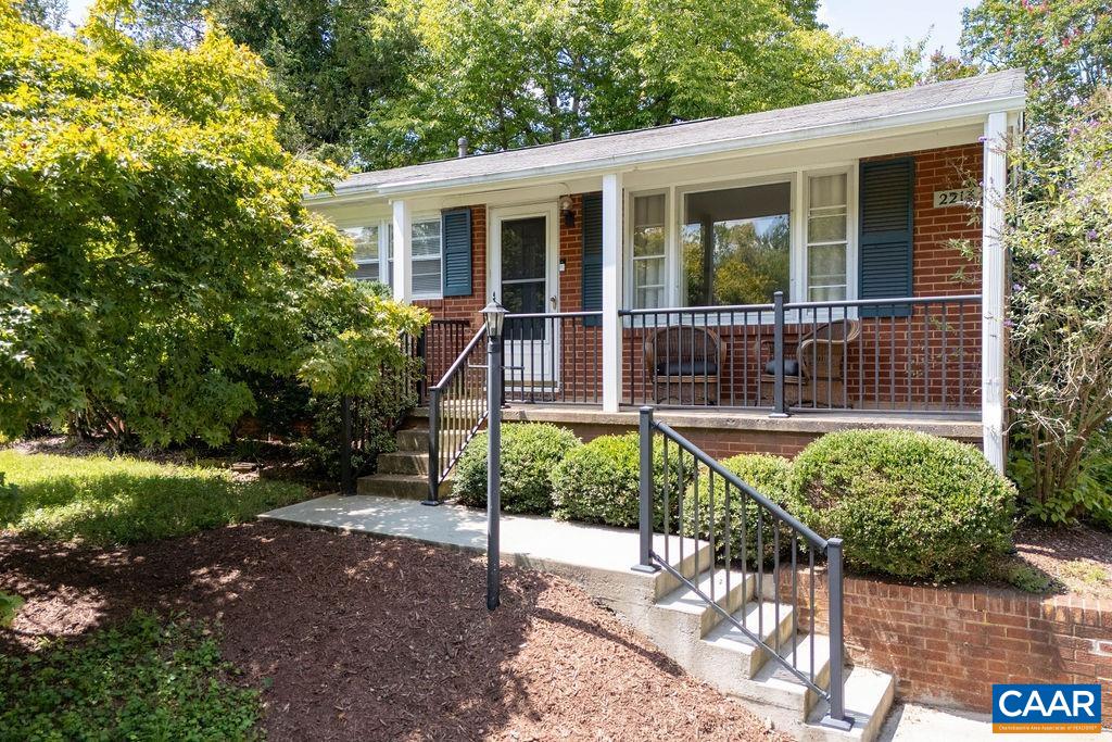 a house with trees in the background