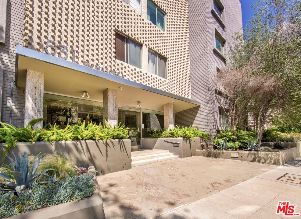 a view of a house with a patio