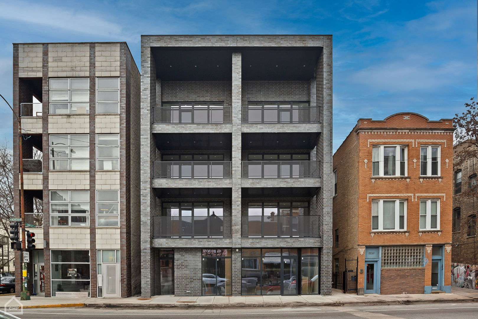 a front view of a building with glass windows