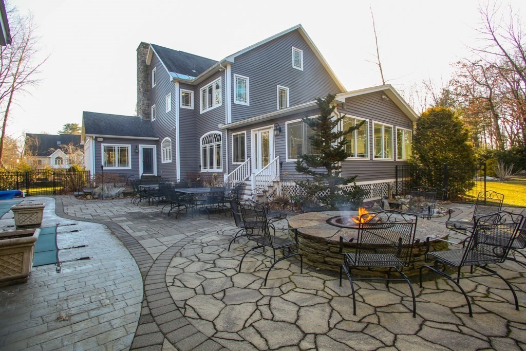 a front view of a house with swimming pool