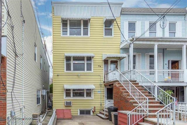 a view of a house with a balcony