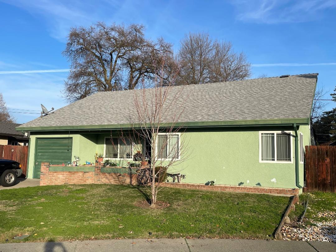 a front view of house with yard