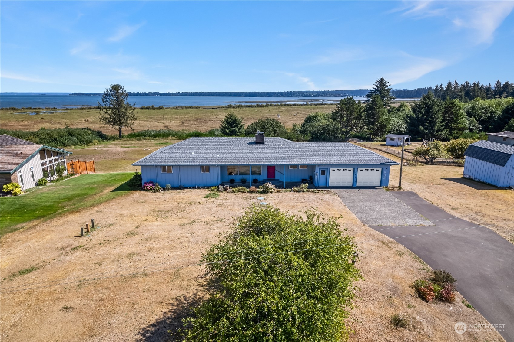 a view of house with ocean view