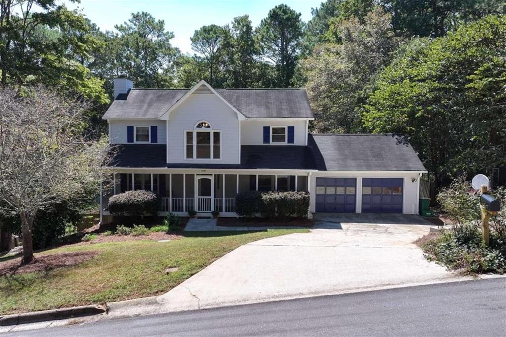 front view of a house with a yard