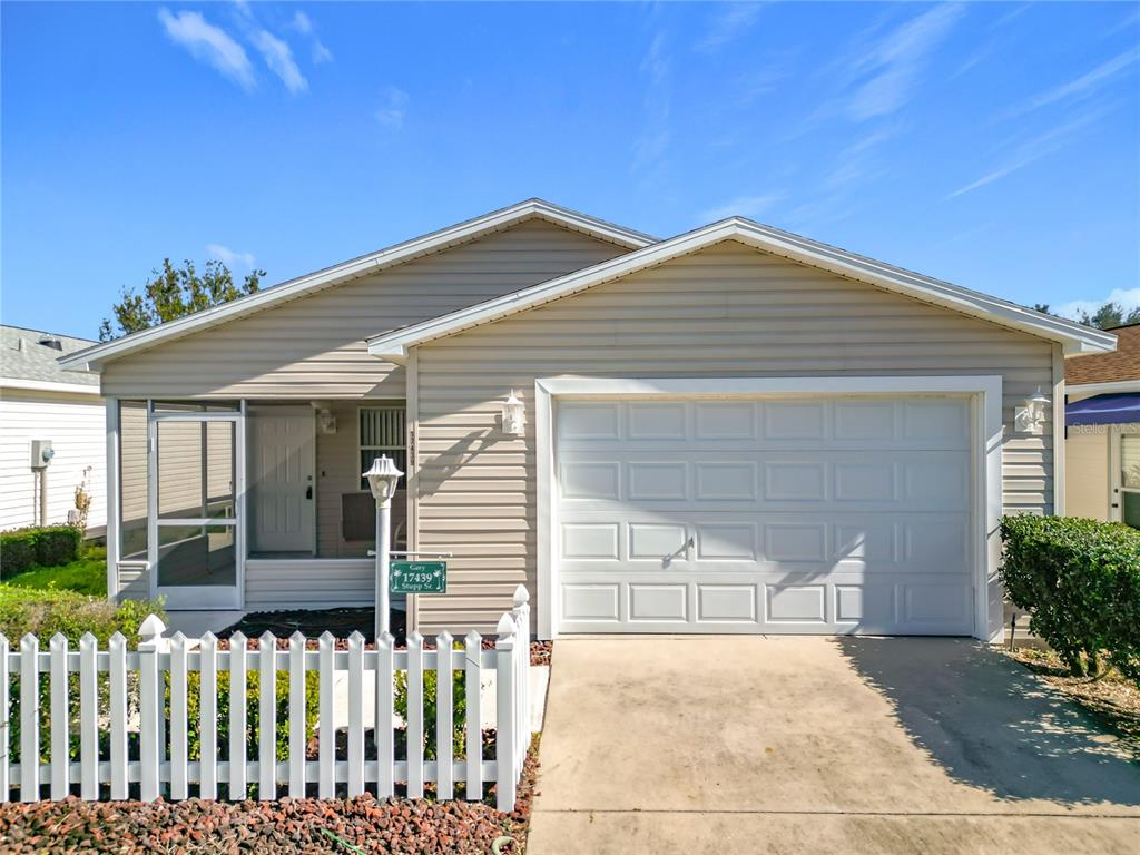 a front view of a house with a garage