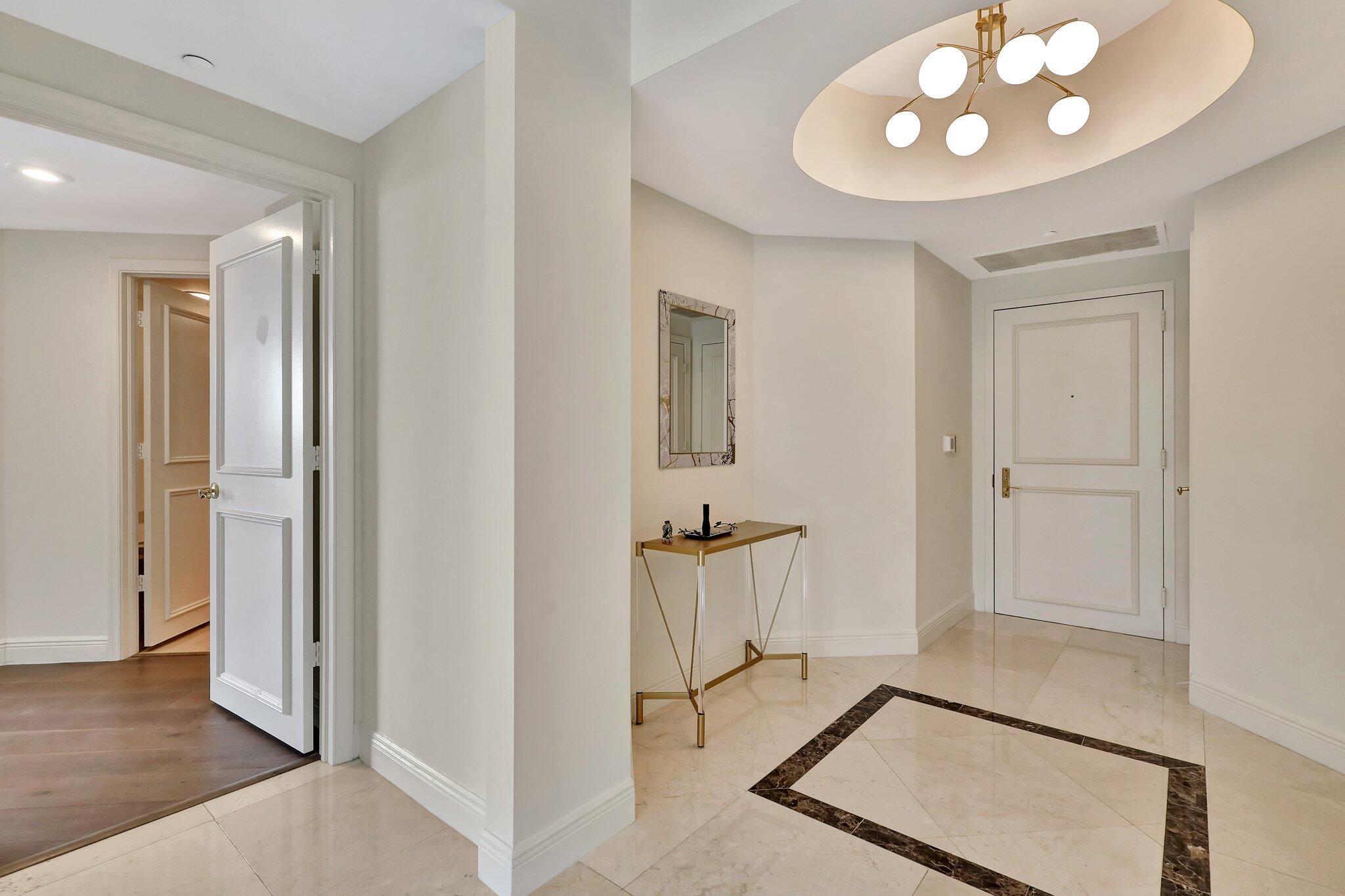 wooden floor in an empty room and a mirror