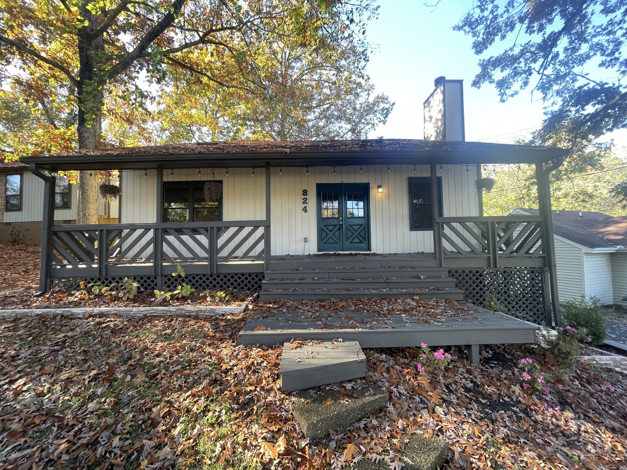 a front view of a house with yard