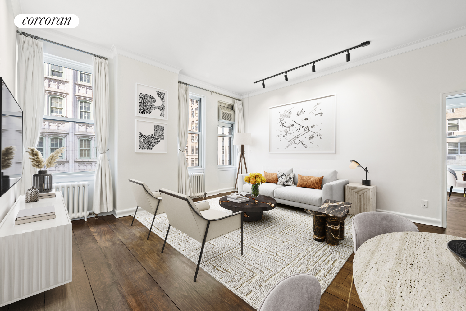 a living room with furniture and a table