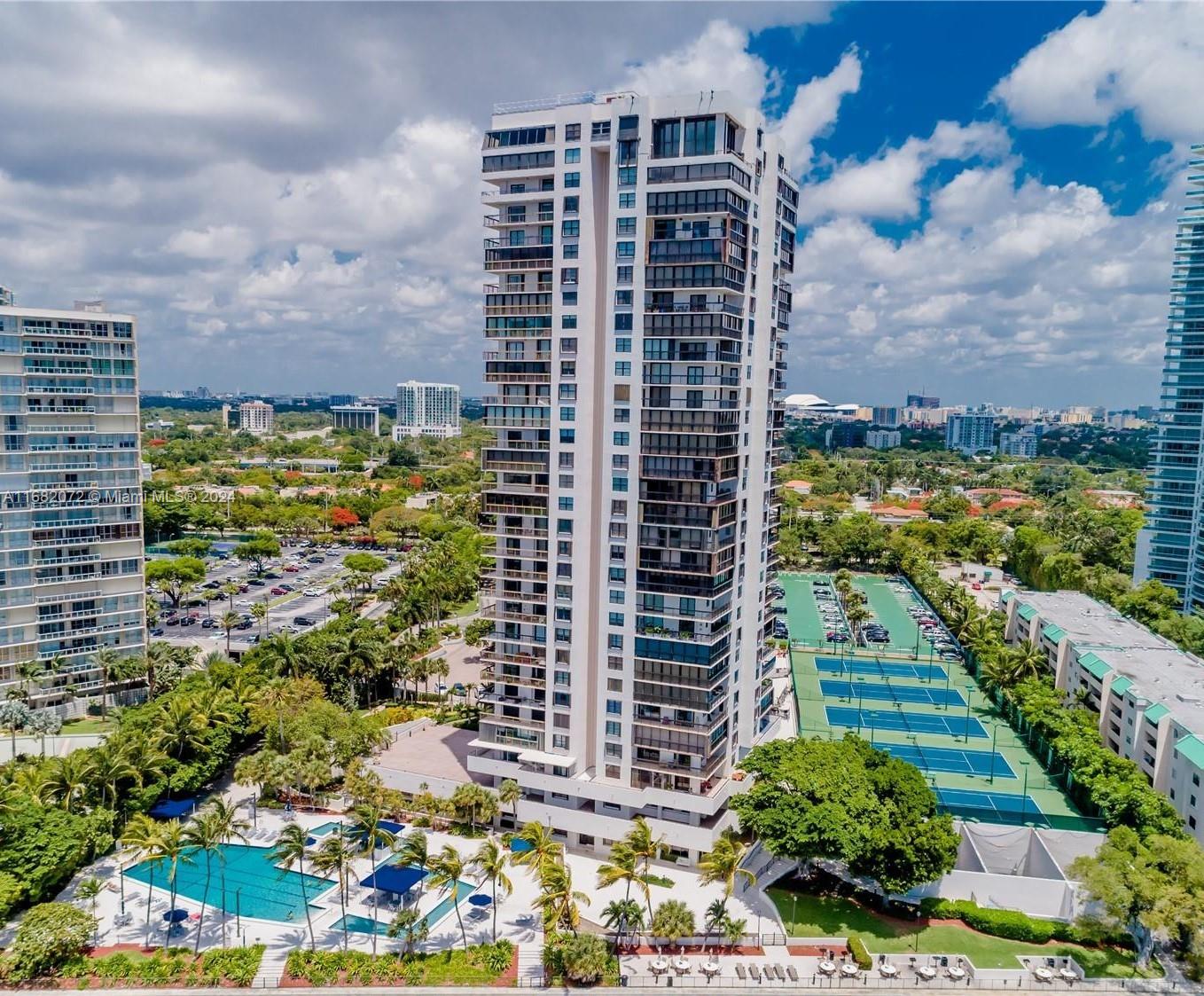 a view of a city with tall buildings