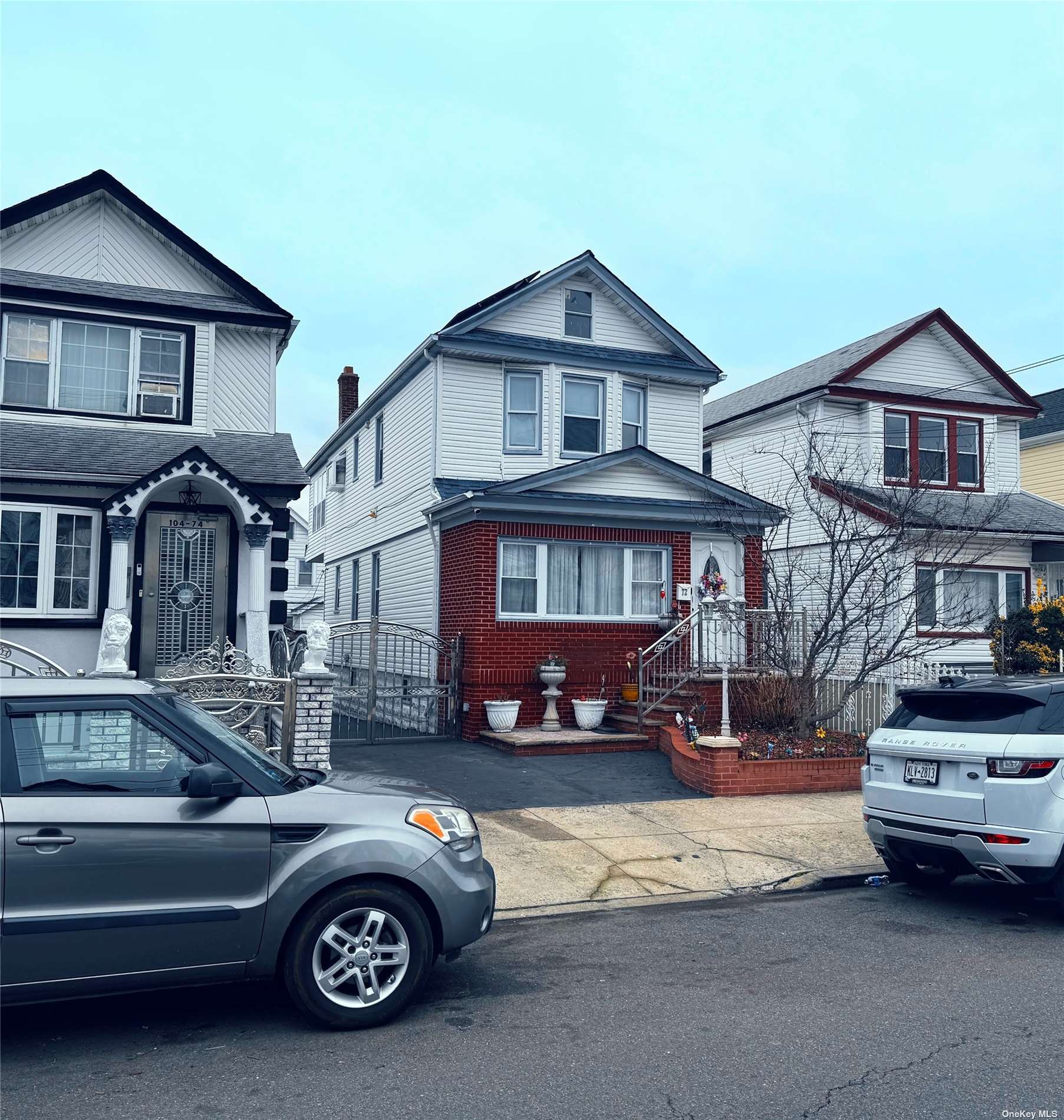 a car parked in front of a house