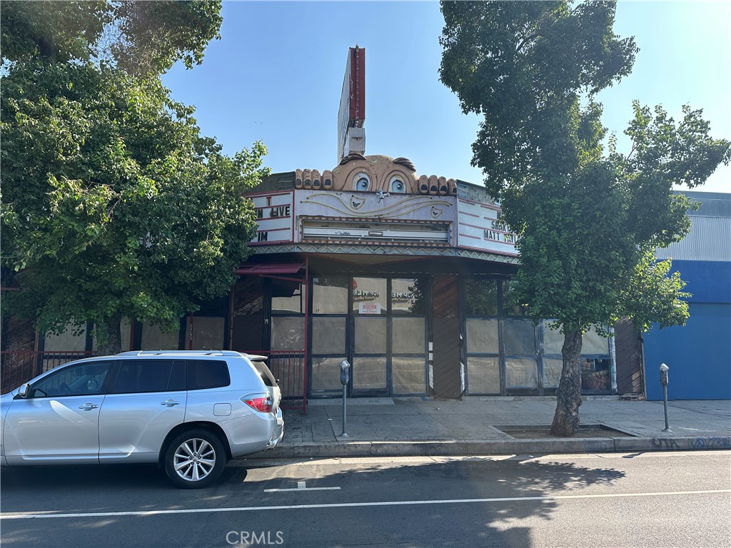 a front view of a house with parking space