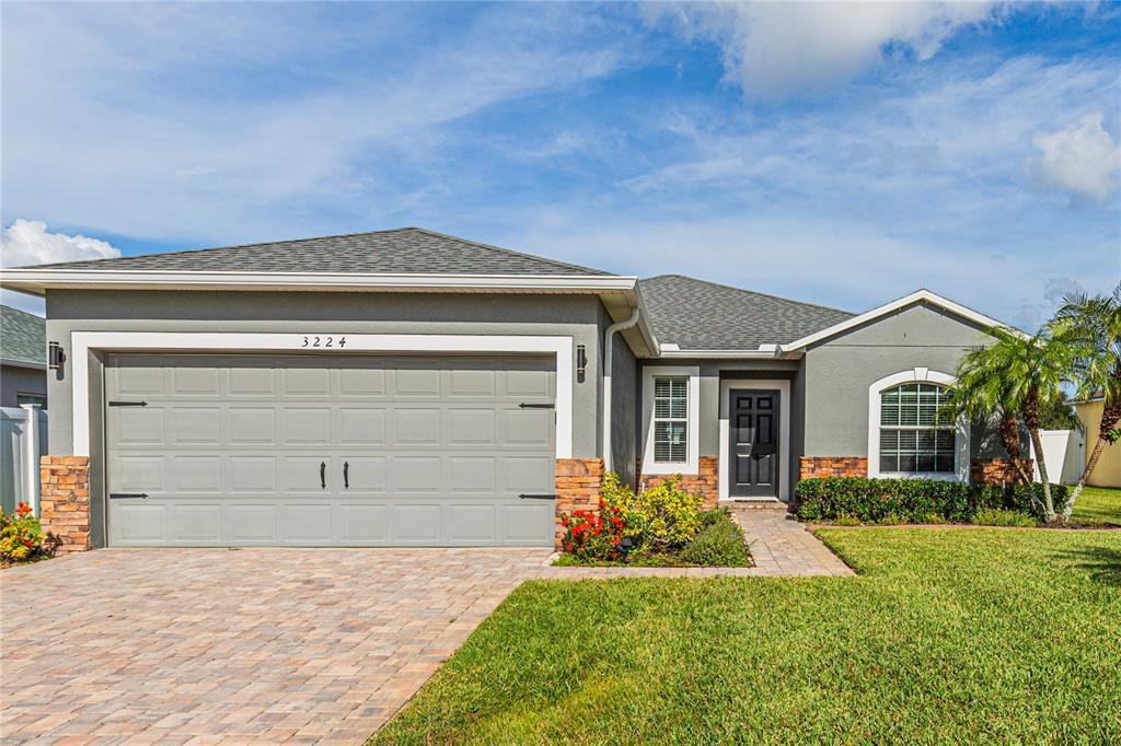 front view of house with a yard