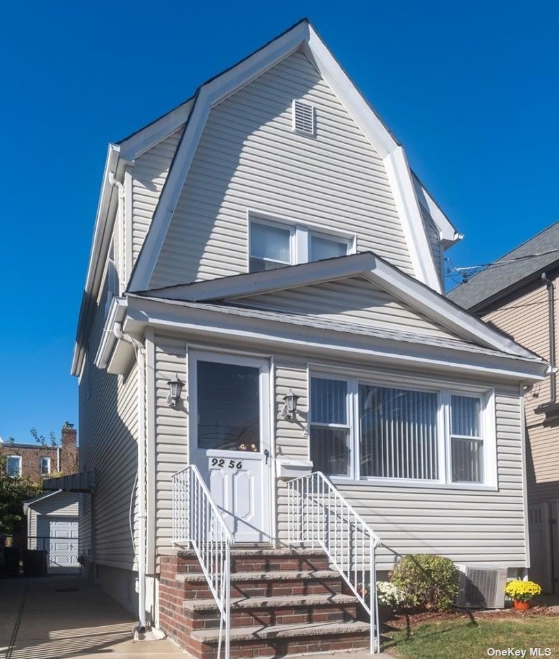 a view of a house with a white door