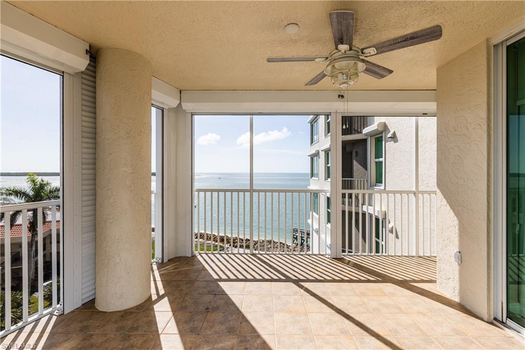 a view of a balcony with a chandelier