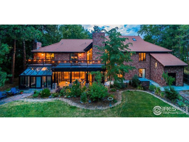 $1,700,000 | 12570 West 60th Avenue | Candlelight