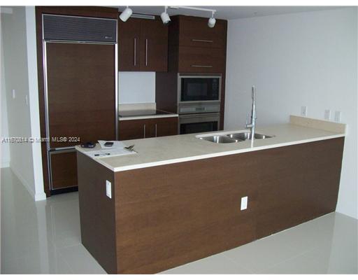 a utility room with washer and dryer